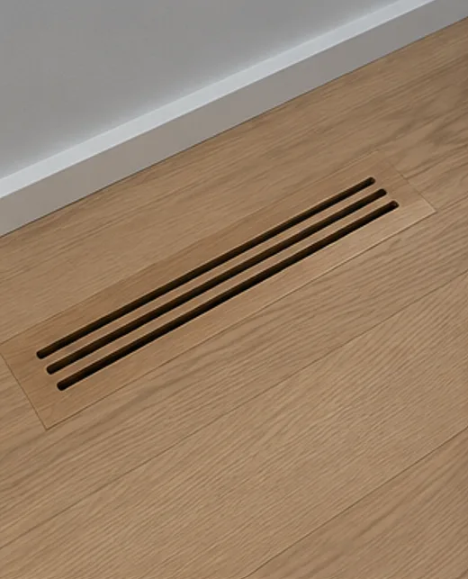 Linear slot wooden floor vent with parallel milled slots