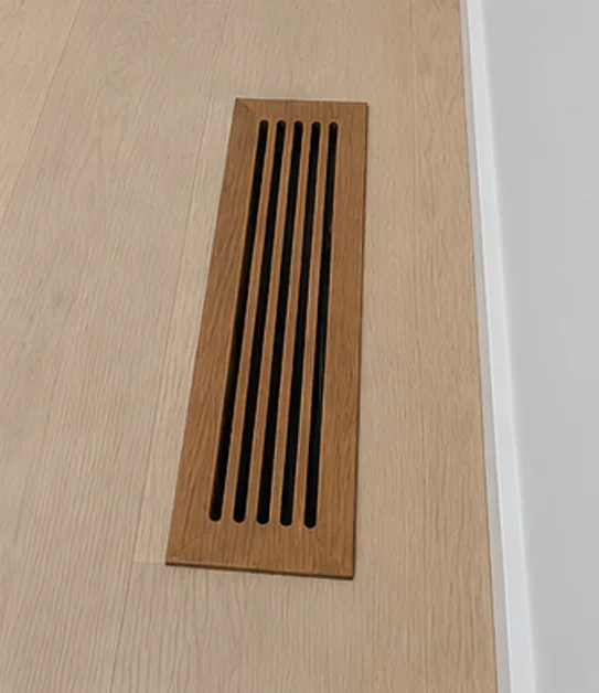 Tall narrow vertical wooden vent register for baseboard installation