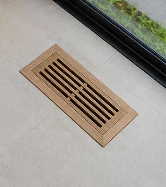 Natural white oak floor register with warm grain and slotted face